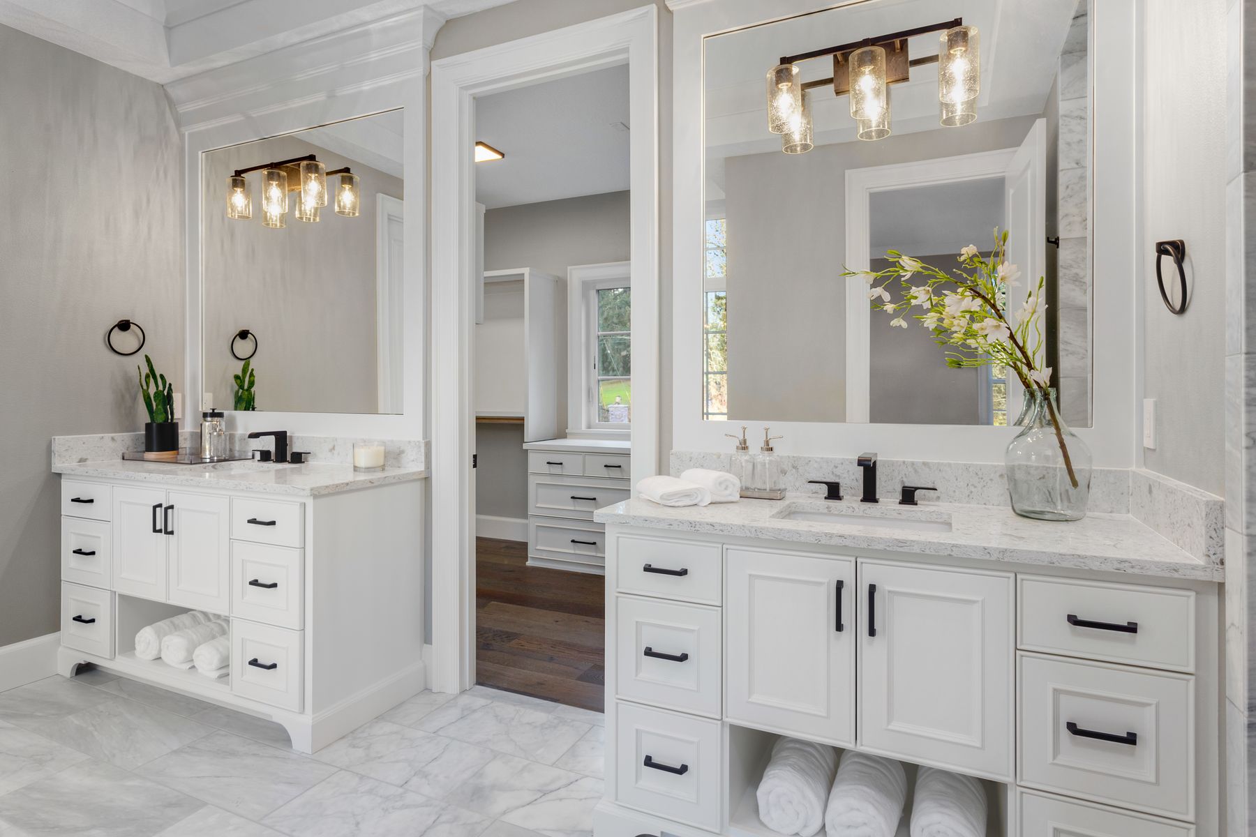 White bath vanities specified with the cabinet line