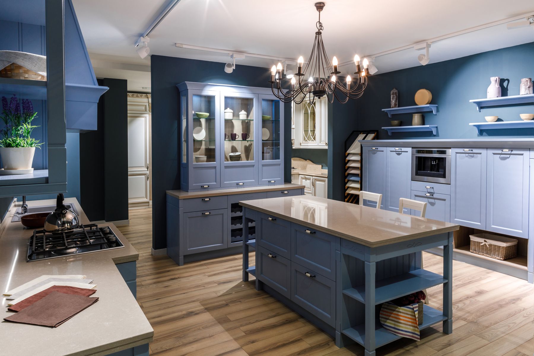 Blue painted kitchen cabinetry and island in Fort Walton Beach, FL