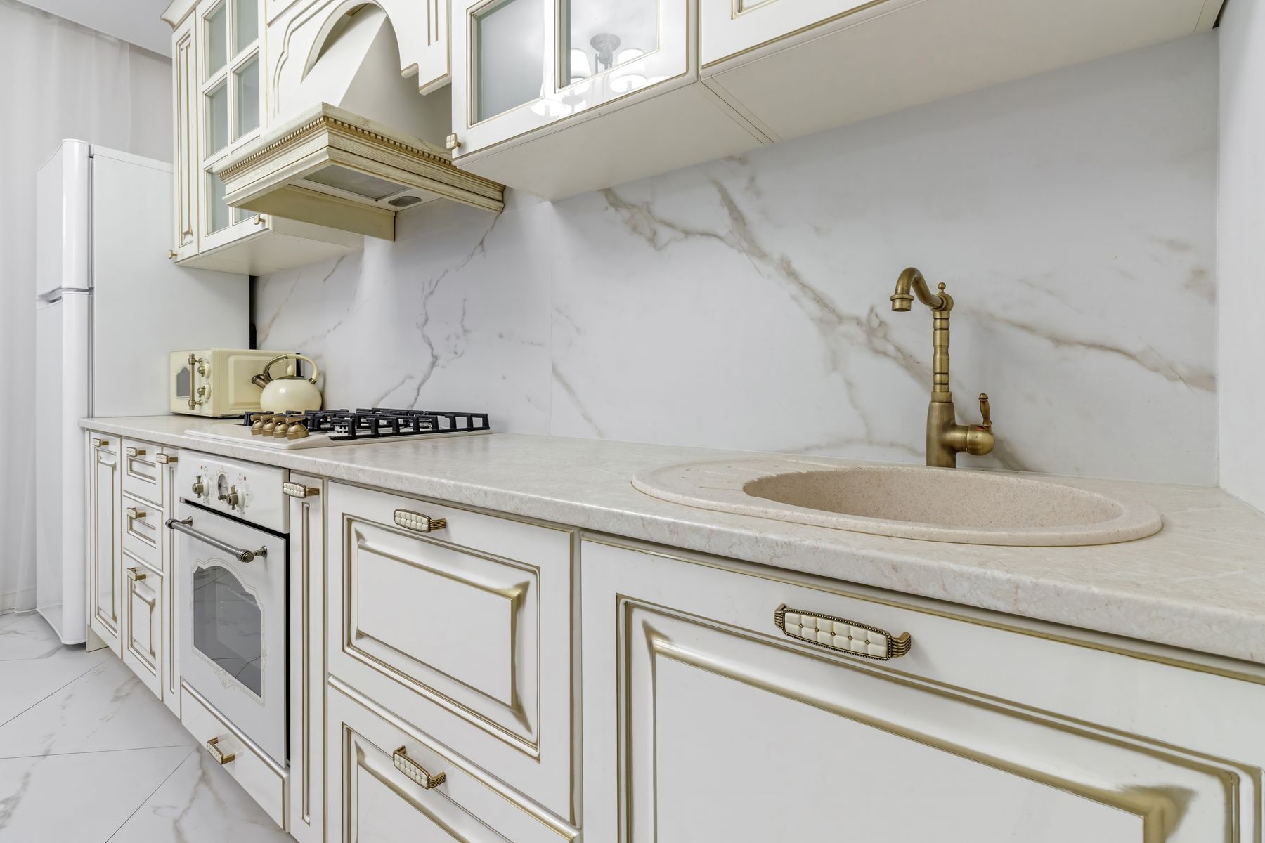 Cream quartz counters in a classic kitchen