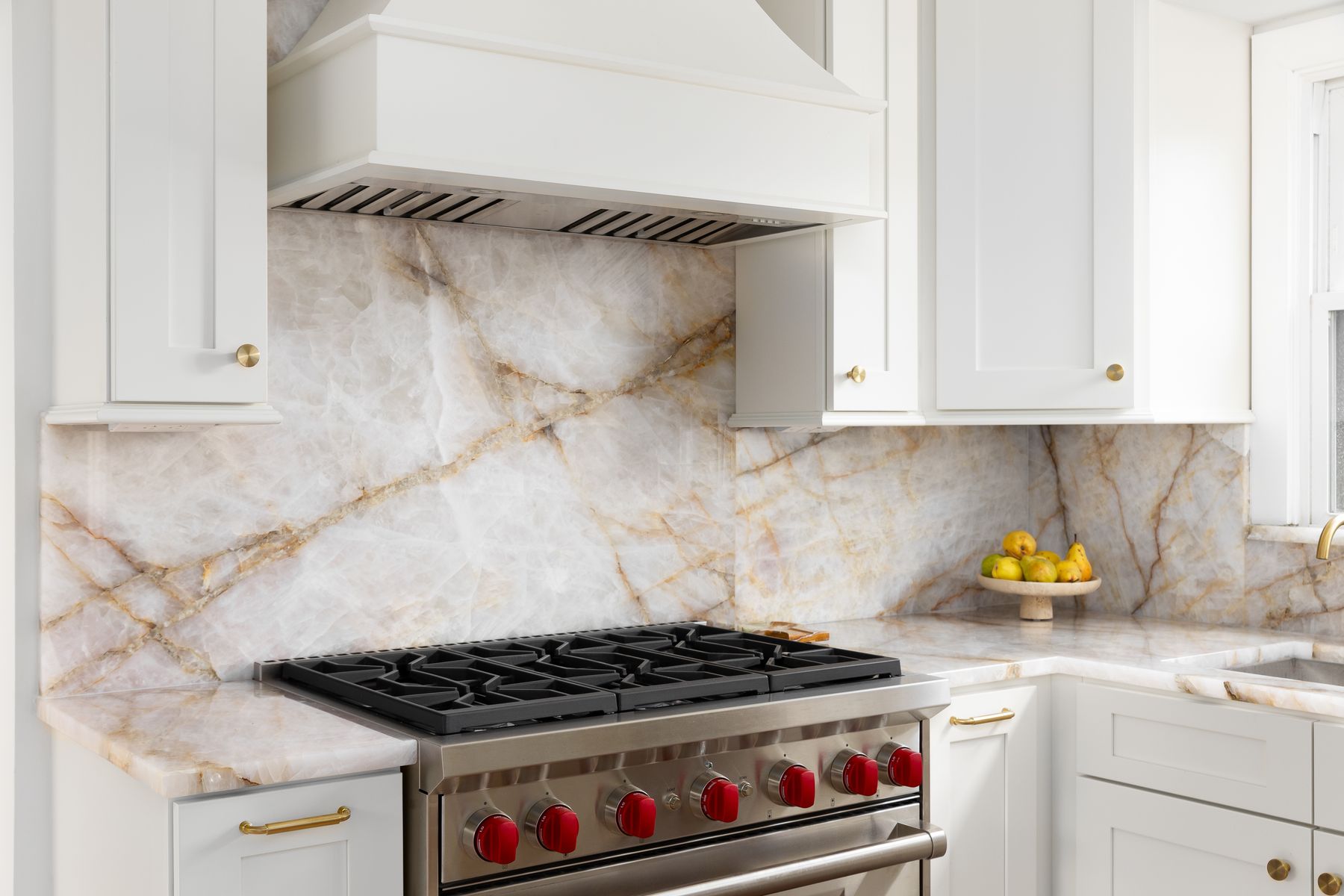 Natural stone slab backsplash and range wall in Fort Walton Beach, FL