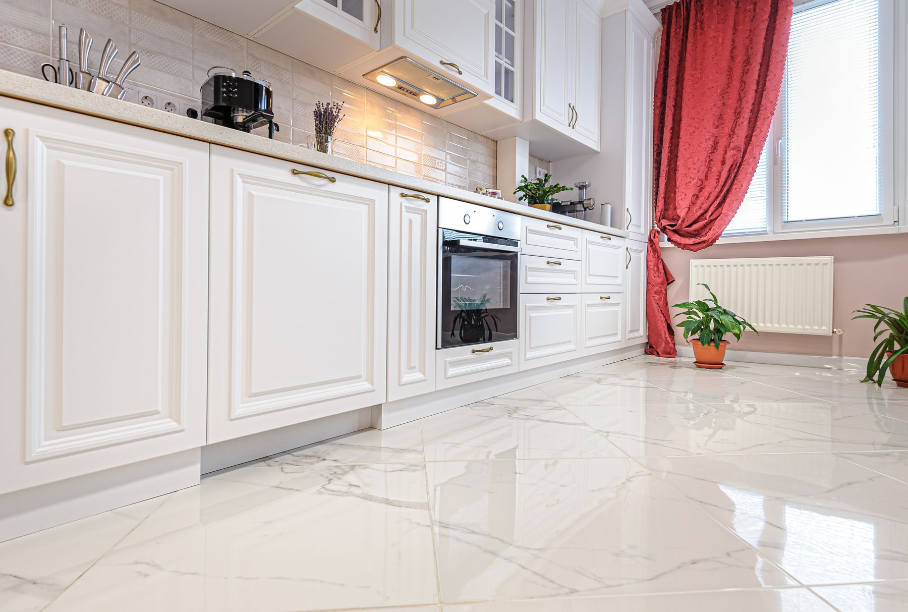 Polished marble tile kitchen floor