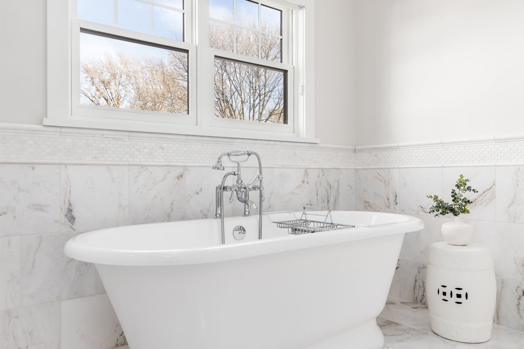 Marble tub surround with freestanding tub in Fort Walton Beach, FL